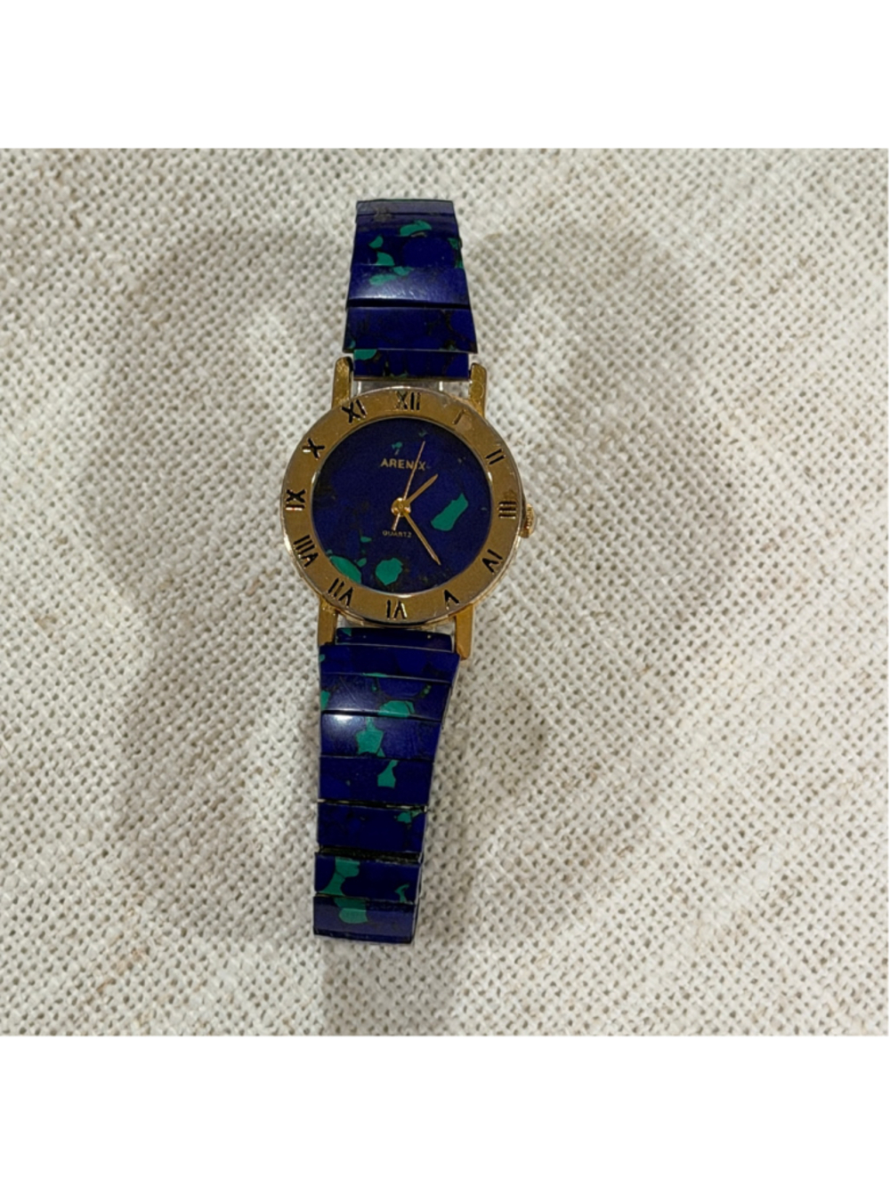 Arenix Women’s Quartz Watch Blue Stone Inlay Gold Tone Roman Numeral